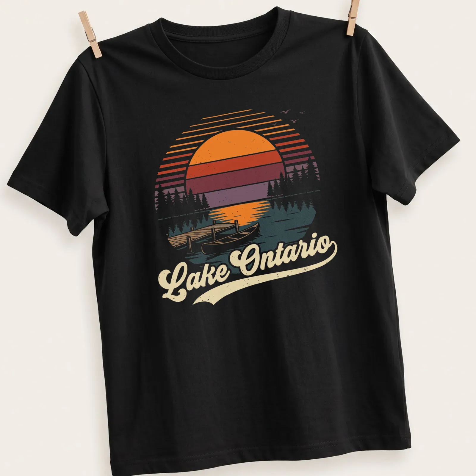 Retro vintage print of Lake Ontario with a canoe and dock at sunset. — printed on a unisex t-shirt