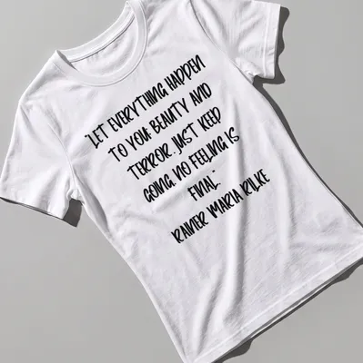Inspirational quote by Rainer Maria Rilke in handwritten script on a white — printed on a women's shirt