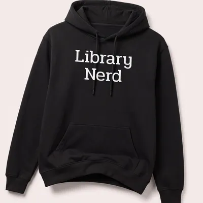 Bold typography T-shirt with 'Library Nerd' text in white — printed on a unisex hoodie