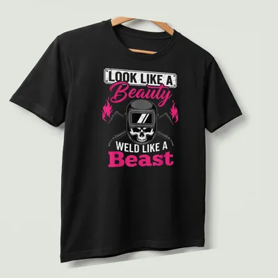 Bold graphic shirt featuring a skull and the text about beauty and welding — printed on a unisex t-shirt (angled view)