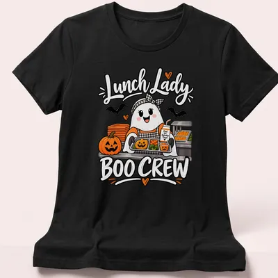 Cute ghost lunch lady design with Halloween-themed text in orange, black, white, and green — printed on a women's shirt