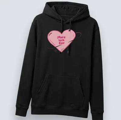 Kawaii style shirt with a heart and playful text 'Merz leck Eier' in pink and purple — printed on a unisex hoodie