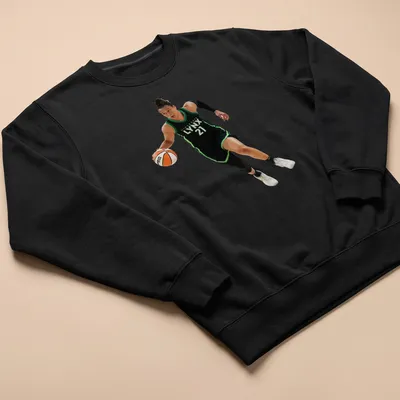 Illustration of a basketball player with Minnesota Lynx 21 text in black, green, white, and orange — printed on a unisex sweatshirt