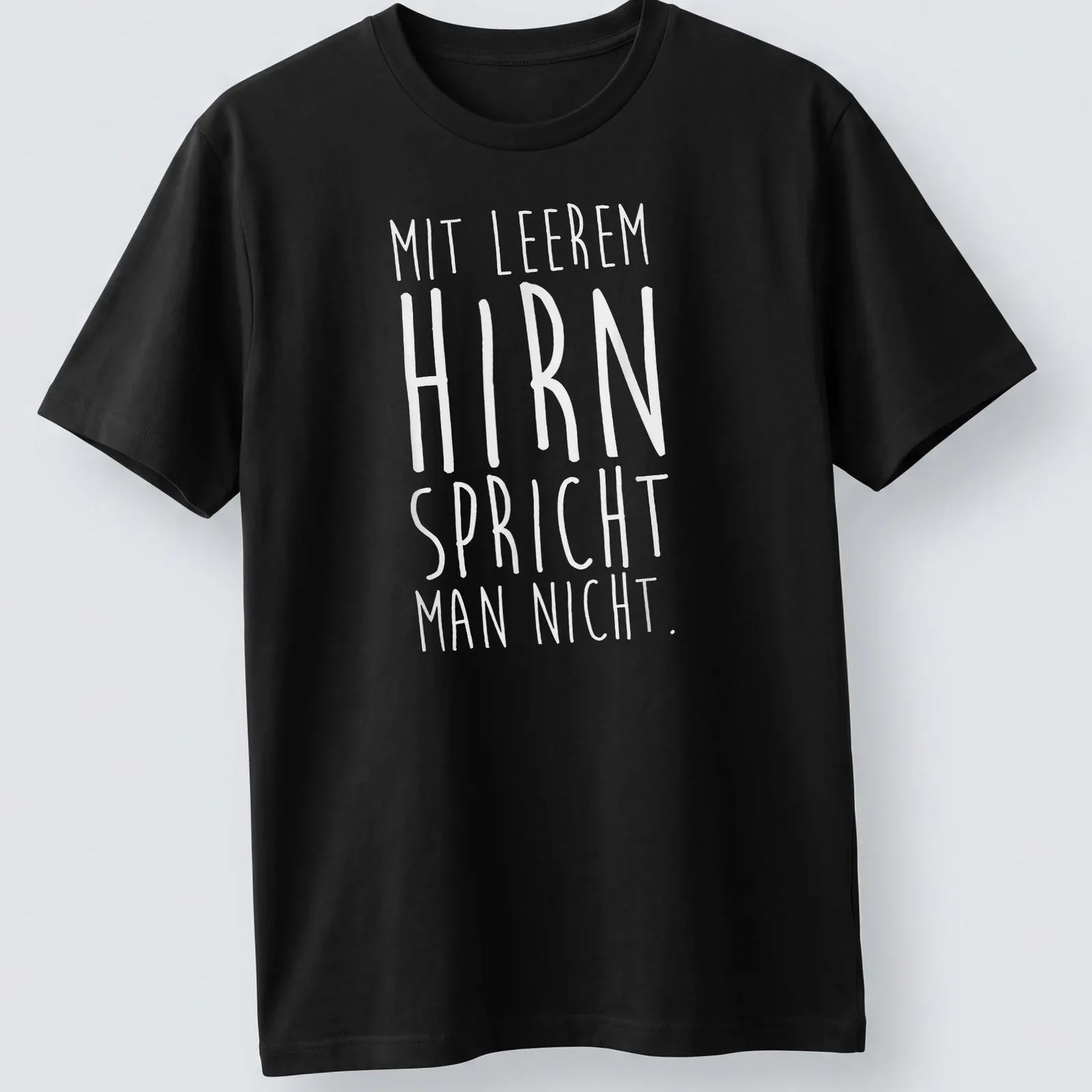 Minimalist text design featuring the phrase Mit Leerem Hirn Spricht Man Nicht in white — printed on a unisex t-shirt