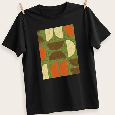 Textured abstract geometric shapes in green, orange, brown, cream, and yellow. — printed on a unisex t-shirt
