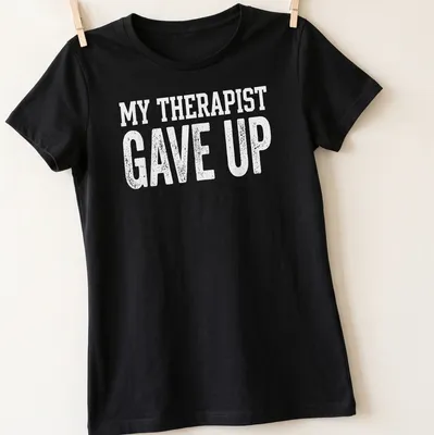 Bold typography t-shirt with sarcastic mental health slogan in white — printed on a women's shirt