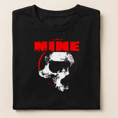 Distressed T-shirt featuring the word 'NINE' above a design of skulls in red and white. — printed on a women's shirt