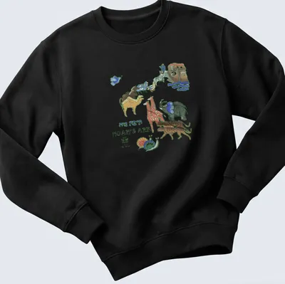 Vintage Noah's Ark t-shirt featuring colorful animals and whimsical illustration — printed on a unisex sweatshirt
