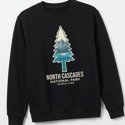 Mountain landscape featuring Diablo Lake and trees with modern graphic style — printed on a unisex sweatshirt