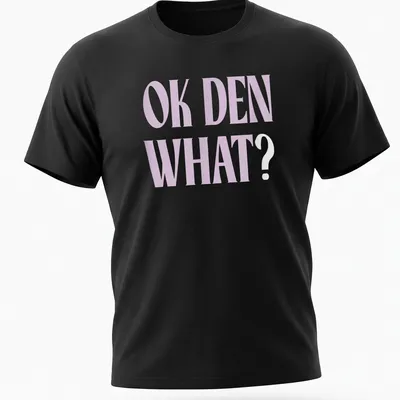 Light purple t-shirt with bold printed text saying OK DEN WHAT