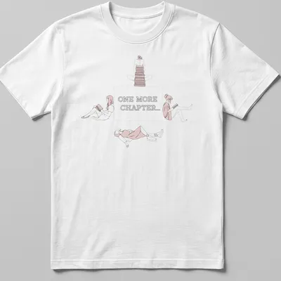 Line-art graphic tee showing the text 'One More Chapter...' with book-themed illustrations