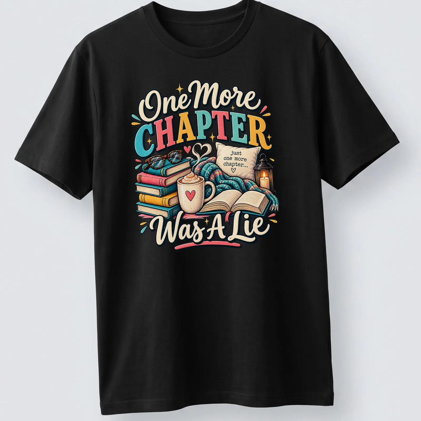 Whimsical design featuring books and coffee with the phrase 'One More Chapter Was A Lie' — printed on a unisex t-shirt