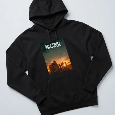 Vibrant sunset scene with a surfing van and people, highlighted by the text 'OUTER BANKS' — printed on a unisex hoodie