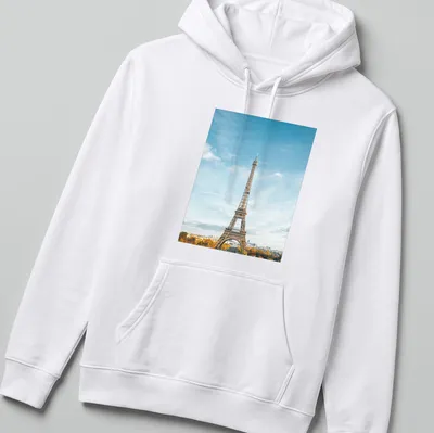 Photographic print of Eiffel Tower with text 'Paris, France' in blue and gold — printed on a unisex hoodie