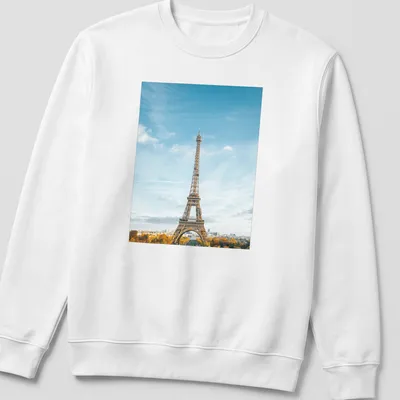 Photographic print of Eiffel Tower with text 'Paris, France' in blue and gold — printed on a unisex sweatshirt