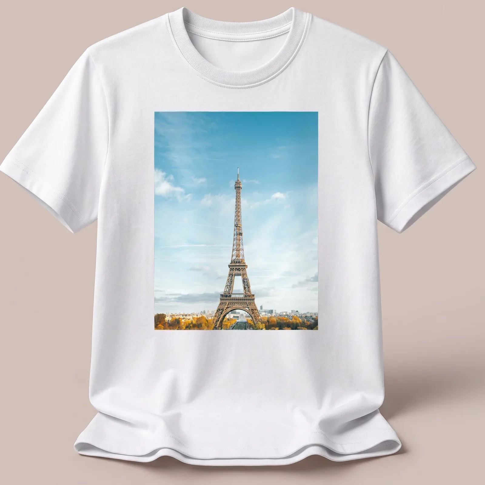Photographic print of Eiffel Tower with text 'Paris, France' in blue and gold — printed on a unisex t-shirt