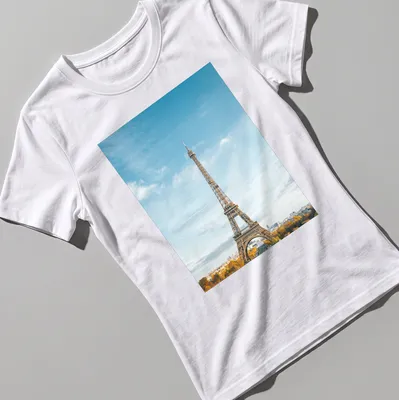 Photographic print of Eiffel Tower with text 'Paris, France' in blue and gold — printed on a women's shirt