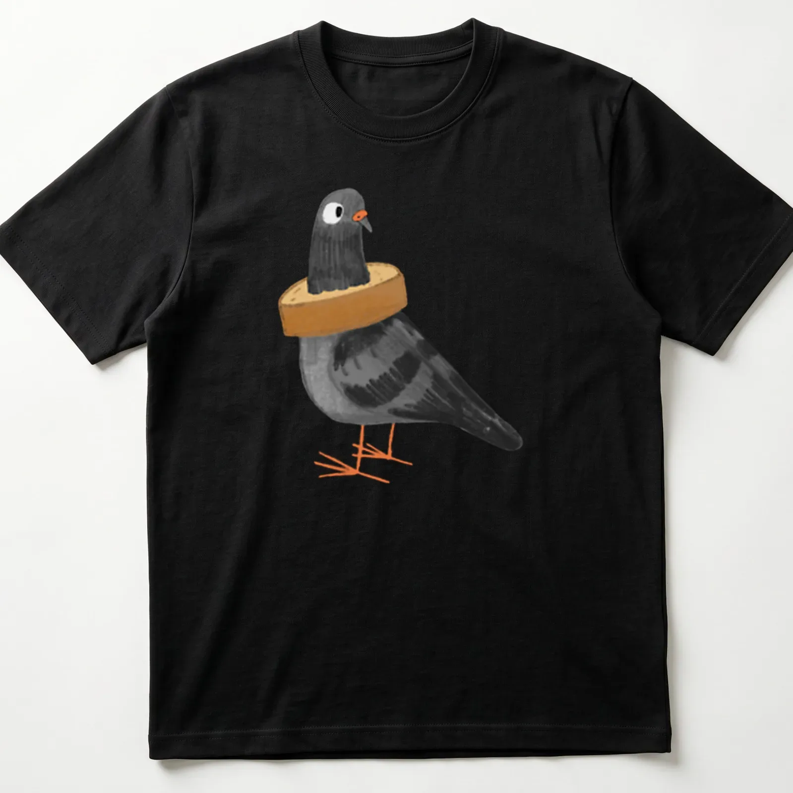 Cartoon illustration of a black pigeon stuck in a loaf of bread with humorous text — printed on a unisex t-shirt