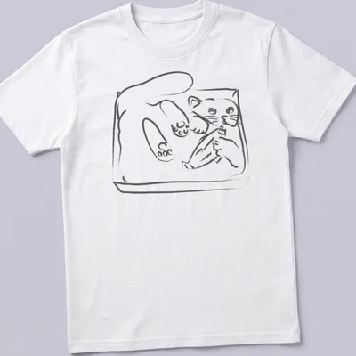Simple line-art of a playful kitten wiggling in a tray in black and white — printed on a unisex t-shirt