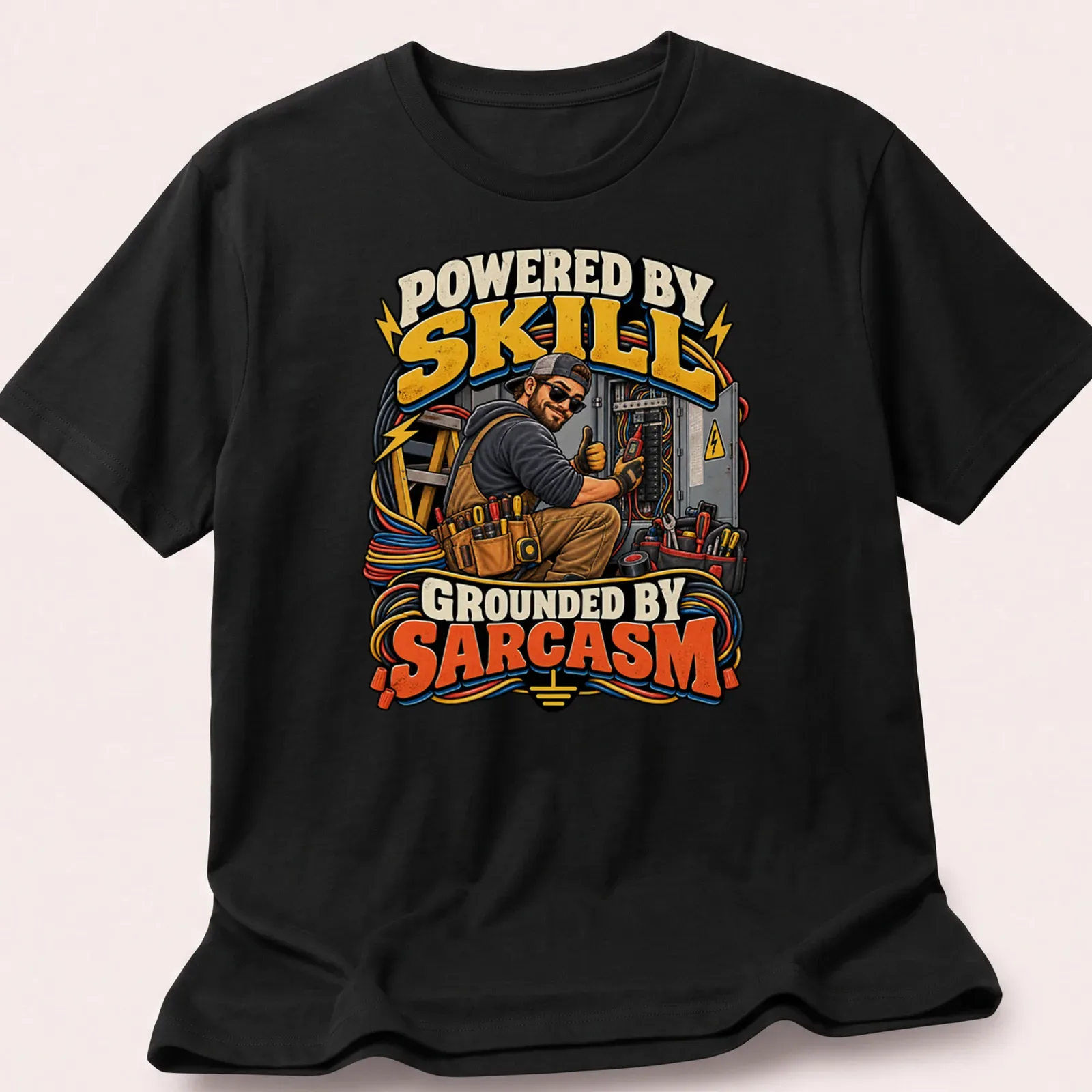 Bold typography t-shirt with the phrase 'Powered By Skill Grounded By Sarcasm' and electrician tools — printed on a unisex t-shirt