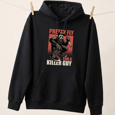 Comic style horror movie t-shirt featuring a masked character with a knife and bold text — printed on a unisex hoodie