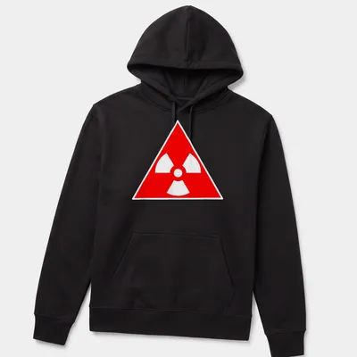 Vintage radioactive symbol graphic on a red — printed on a unisex hoodie