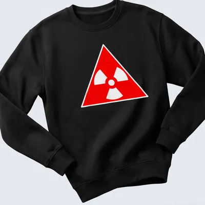 Vintage radioactive symbol graphic on a red — printed on a unisex sweatshirt