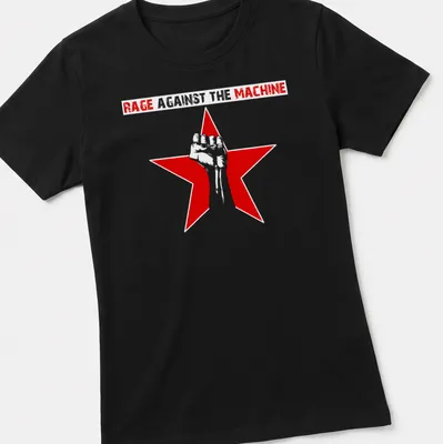 Bold graphic of a raised fist inside a red star with text above — printed on a women's shirt