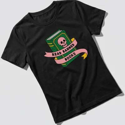 Bold cartoon design featuring a skull and book with the text 'READ BANNED BOOKS' — printed on a women's shirt