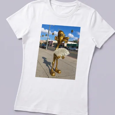 Realistic print of a golden statue holding cash, set against vibrant colors — printed on a women's shirt