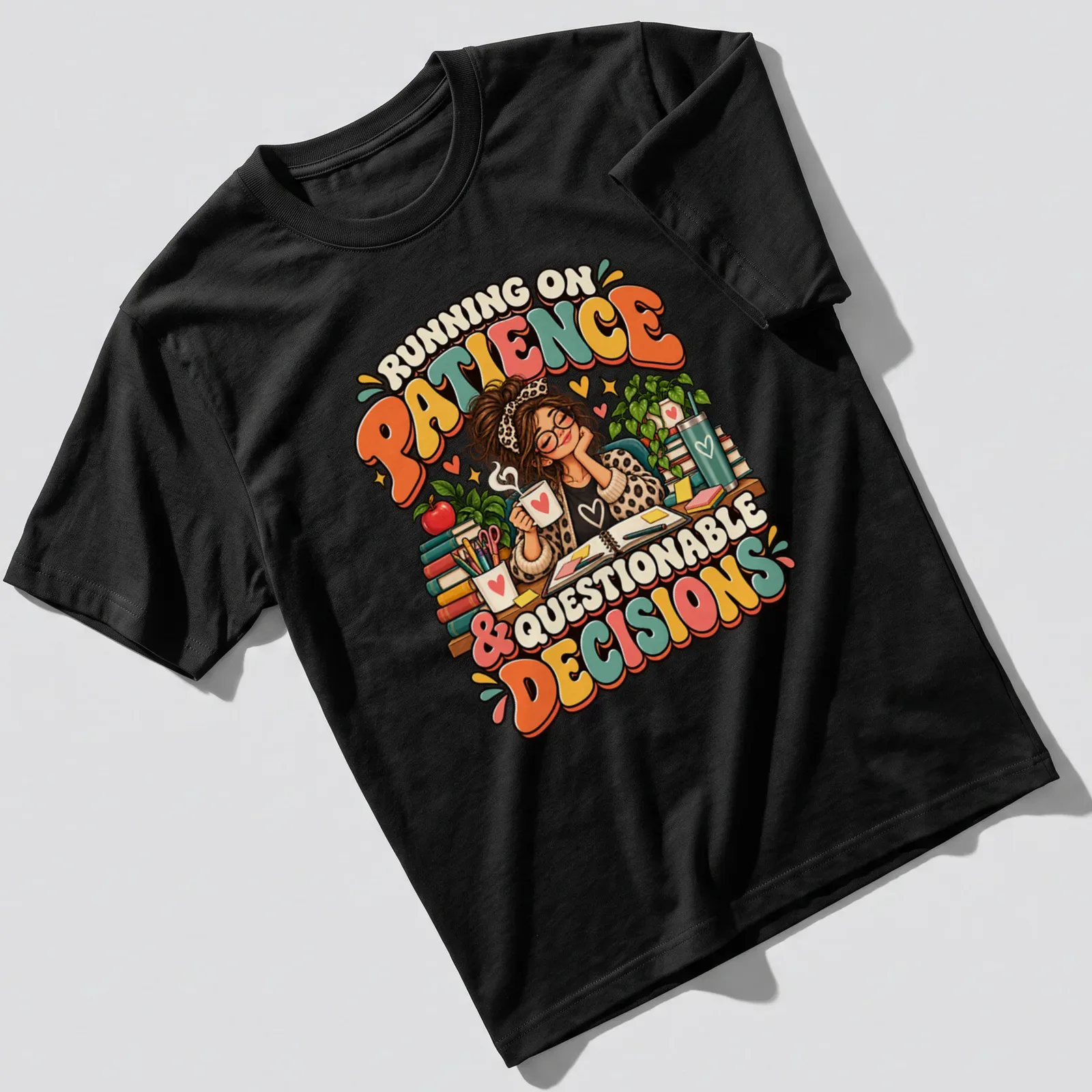 Colorful cartoon t-shirt featuring a female teacher with coffee and books alongside the quote about patience and decisions — printed on a unisex t-shirt