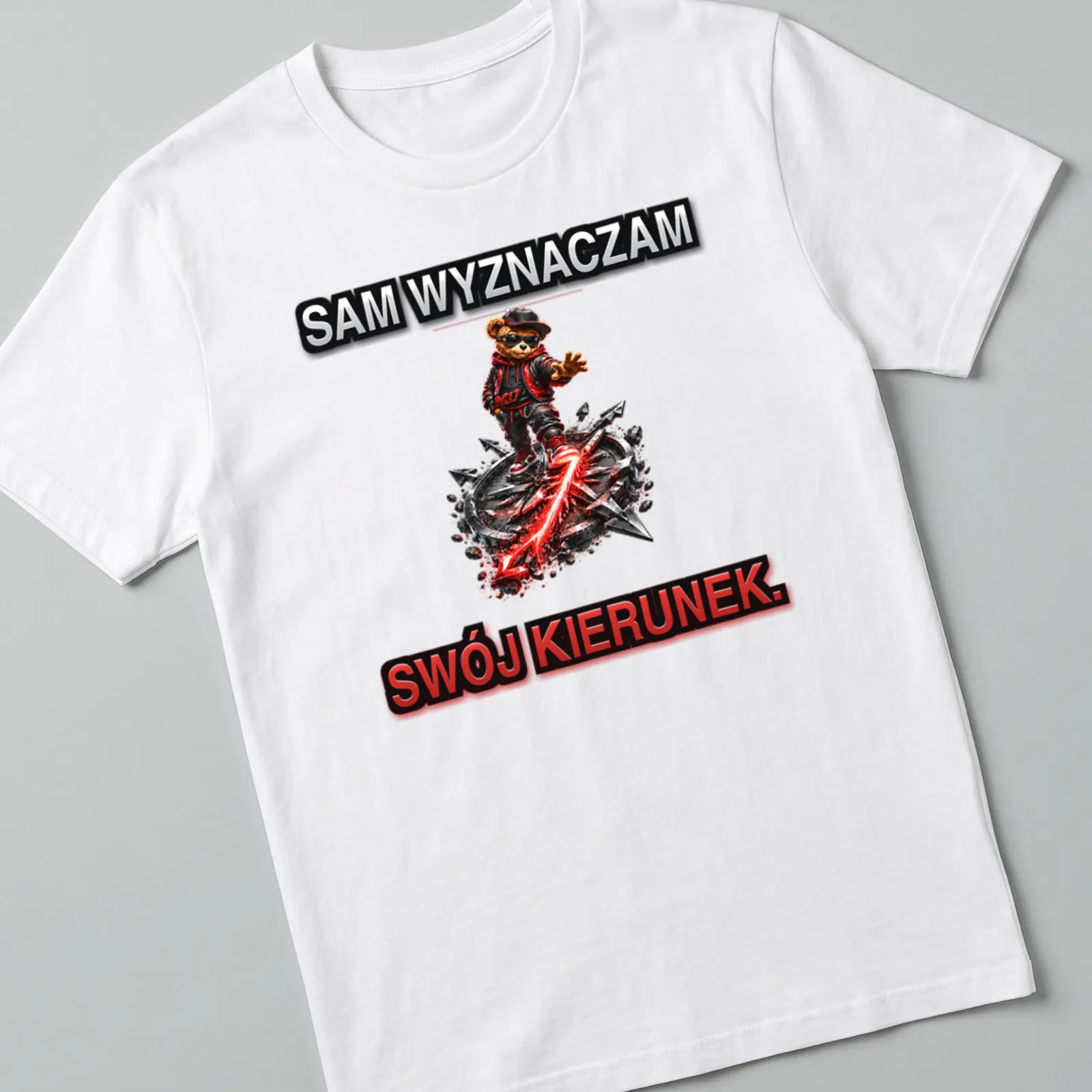 Vibrant graphic of bear character with text SAM WYZNACZAM SWÓJ KIERUNEK in black, red, and white — printed on a unisex t-shirt