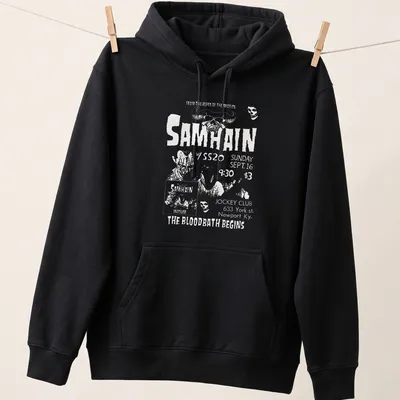Vintage concert poster style Samhain t-shirt with skull and horror imagery — printed on a unisex hoodie