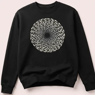 Illustration of a spiraling school of fish in white and light beige — printed on a unisex sweatshirt