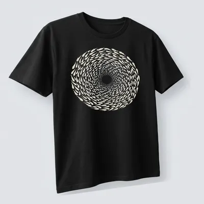 Illustration of a spiraling school of fish in white and light beige — printed on a unisex t-shirt (angled view)