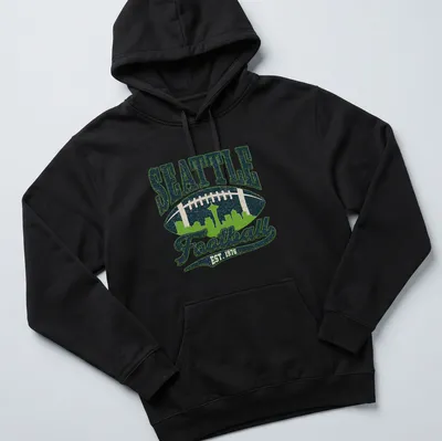 Retro skyline of Seattle with football and text in navy, green, and white — printed on a unisex hoodie