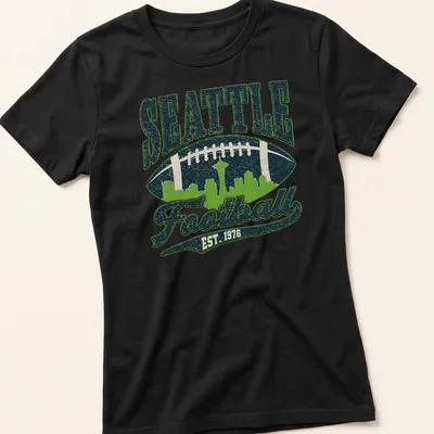 Retro skyline of Seattle with football and text in navy, green, and white — printed on a women's shirt