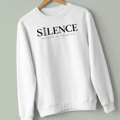 Minimal typography quote t-shirt with the phrase 'Silence Builds Authority' in black and gray text — printed on a unisex sweatshirt