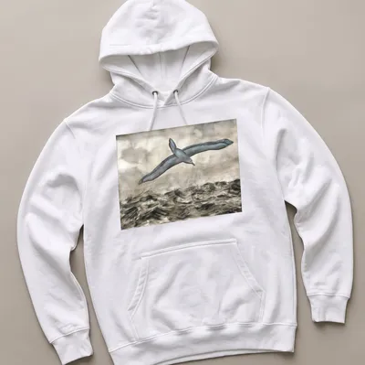 Watercolor print of an albatross flying over waves with grey, blue, and white tones — printed on a unisex hoodie