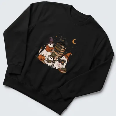 Whimsical illustration of ghosts reading in witch hats with text 'Spooky Bookworms.' — printed on a unisex sweatshirt