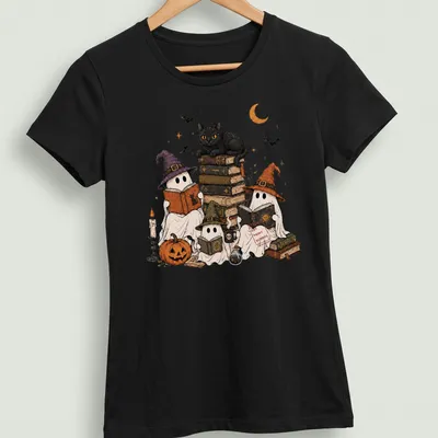 Whimsical illustration of ghosts reading in witch hats with text 'Spooky Bookworms.' — printed on a women's shirt
