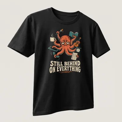 Whimsical multitasking octopus illustration with the text 'Still Behind On Everything' — printed on a unisex t-shirt (angled view)