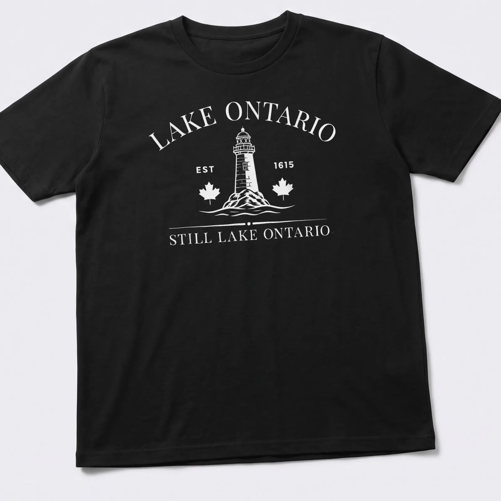 Vintage lighthouse graphic with Lake Ontario established date in black and white — printed on a unisex t-shirt