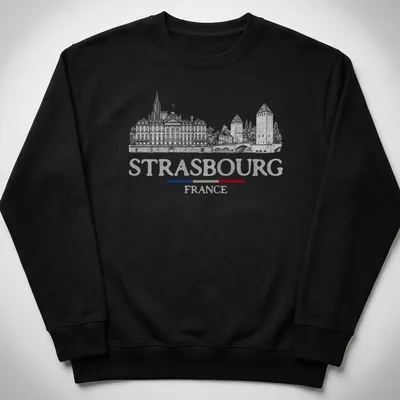 Vintage travel tee featuring Strasbourg architecture with black, white, red, and blue colors — printed on a unisex sweatshirt