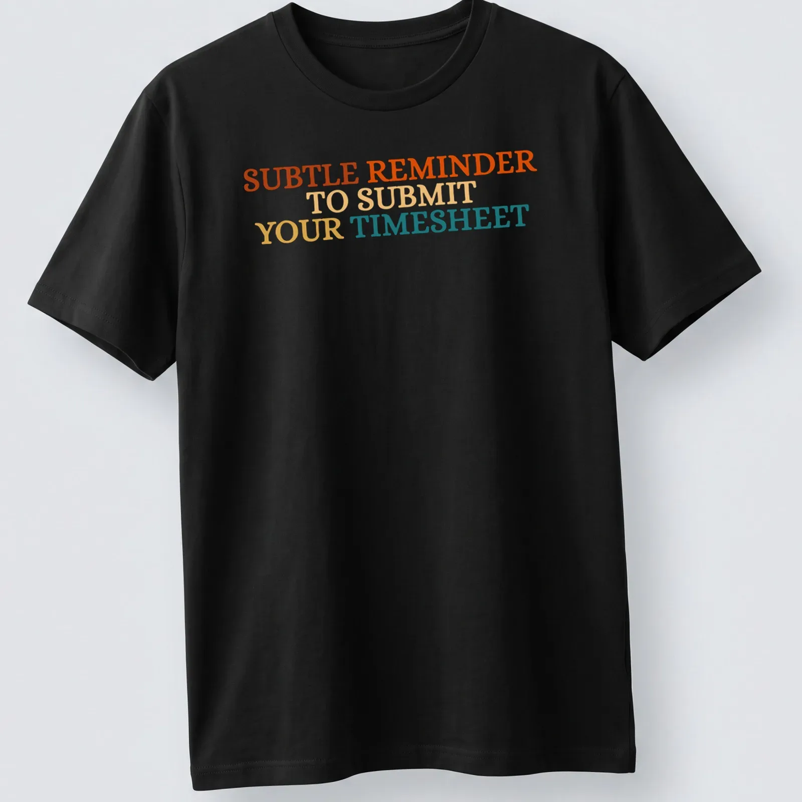 Bold colorful shirt featuring the text 'SUBTLE REMINDER TO SUBMIT YOUR TIMESHEET' — printed on a unisex t-shirt