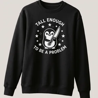 Funny cartoon penguin t-shirt with text about being tall enough to be a problem — printed on a unisex sweatshirt