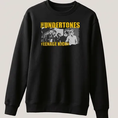 Vintage distressed shirt featuring The Undertones Teenage Kicks graphic in yellow, black, and white — printed on a unisex sweatshirt