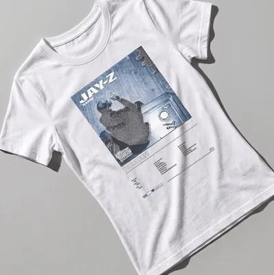 Jay-Z album cover graphic on a T-shirt featuring bold text and colors — printed on a women's shirt