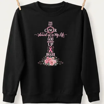 Floral shirt with a cross, pink ribbon, and script that reads about faith in the face of cancer — printed on a unisex sweatshirt