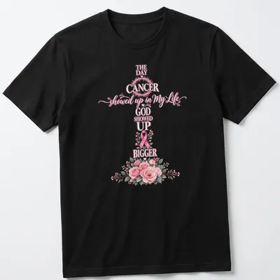 Floral shirt with a cross, pink ribbon, and script that reads about faith in the face of cancer — printed on a unisex t-shirt